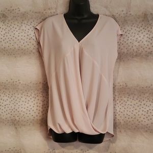 Very feminine, soft peach, v-neck, draped hem top
